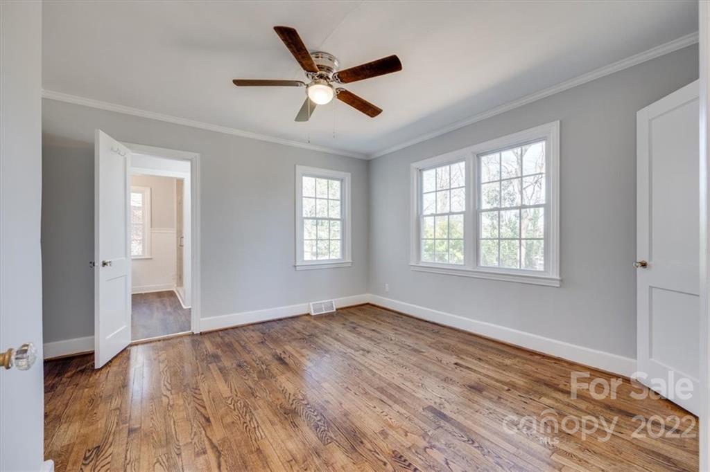 1211 Pinewood Road Rock Hill, SC 29730 - Photo 16 of 19 a view of an empty room with wooden floor and a window