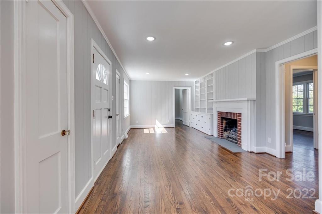 1211 Pinewood Road Rock Hill, SC 29730 - Photo 4 of 19 a view of a livingroom with wooden floor and a fireplace