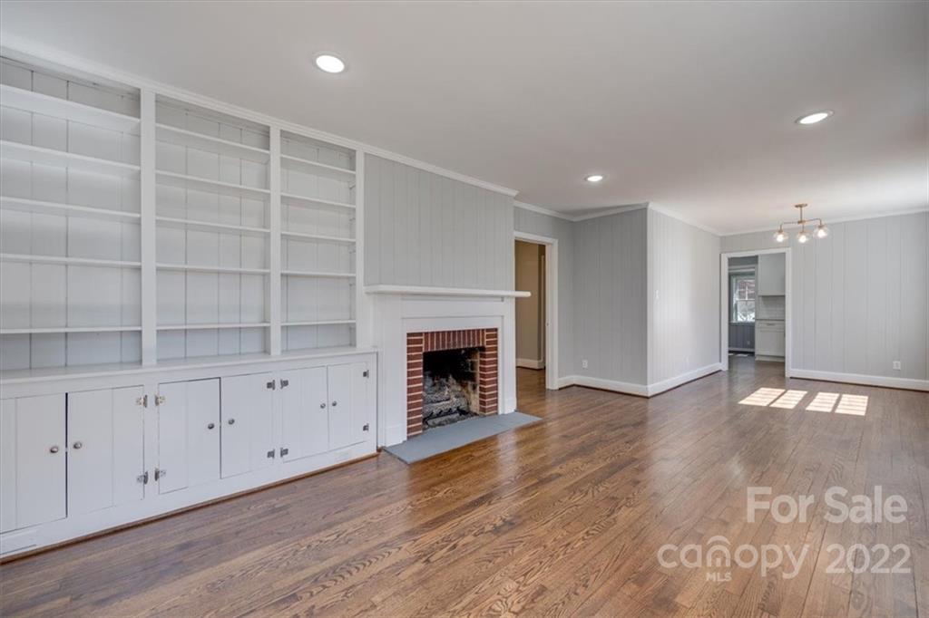1211 Pinewood Road Rock Hill, SC 29730 - Photo 5 of 19 a view of an empty room with a fireplace and a window