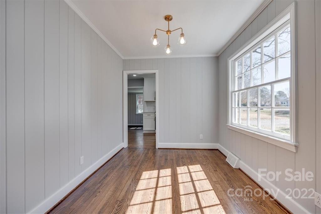 1211 Pinewood Road Rock Hill, SC 29730 - Photo 7 of 19 wooden floor in an empty room with a window
