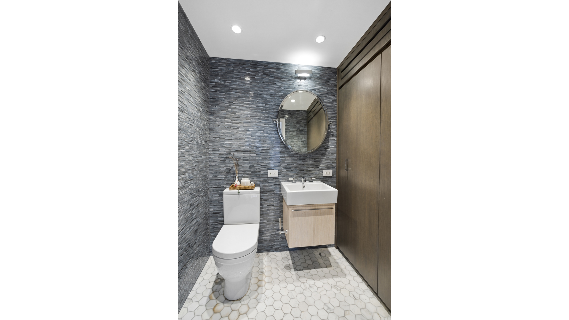 435 East 76th Street, Unit 6A Manhattan, NY 10021 - Photo 5 of 13 a bathroom with a toilet and a shower