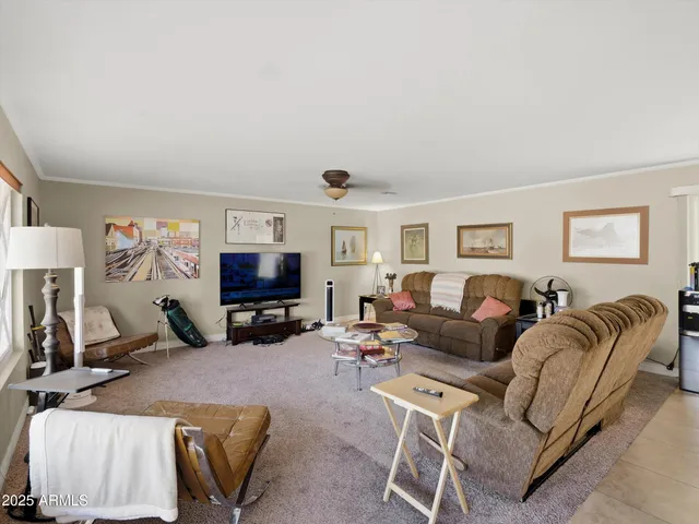 a view of an empty room and closet area