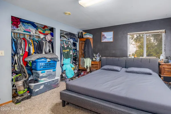 a bathroom with a sink a toilet and shower curtain