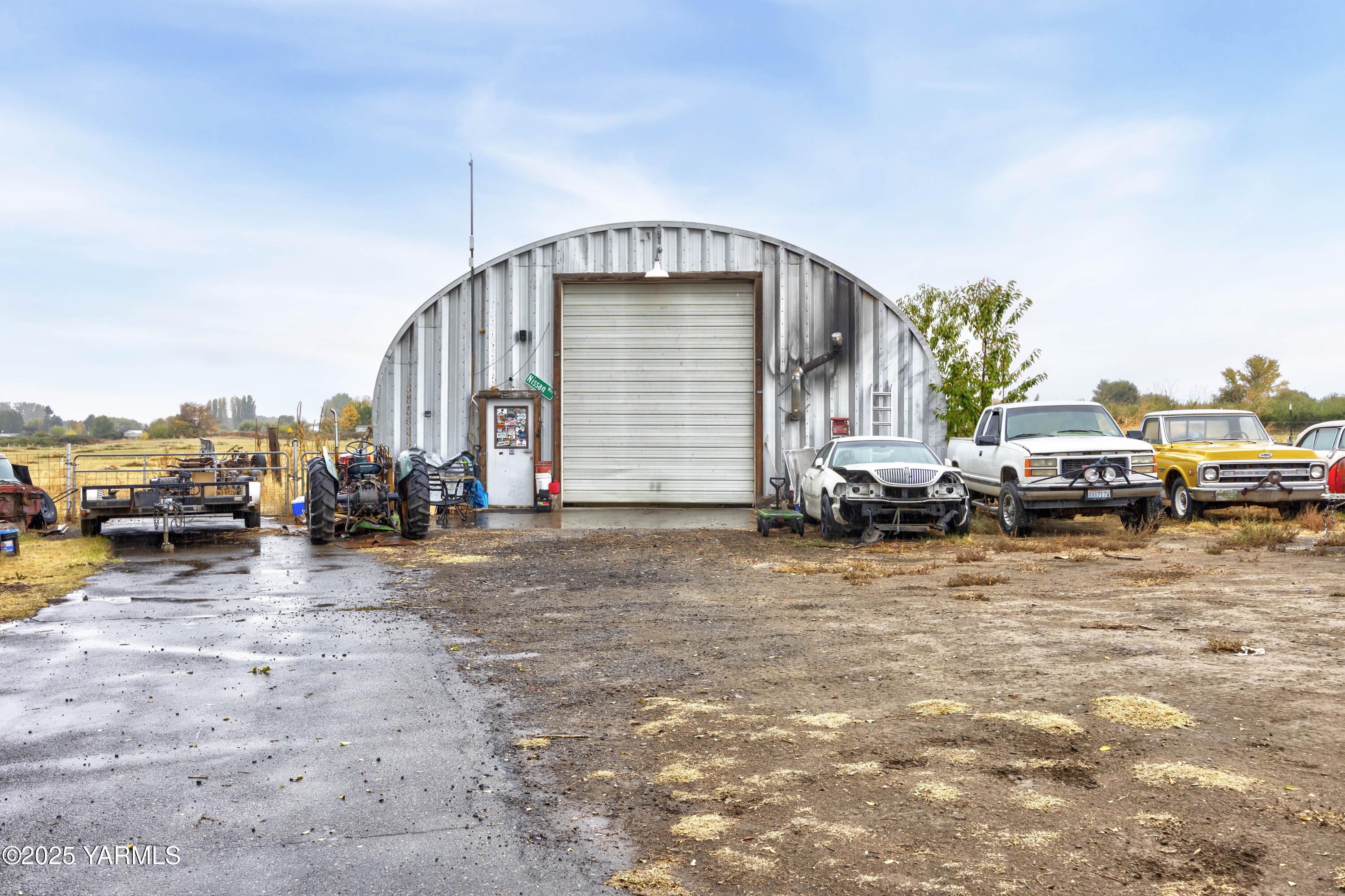 7702 North Griffin Road Grandview, WA 98930 - Photo 19 of 29 a view of car parked in front of house