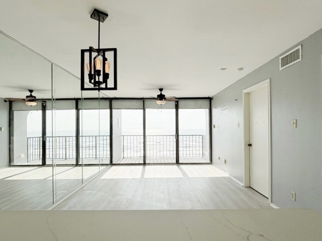 11949 Termini-San Luis Pass Road, Unit 603 Galveston, TX 77554 - Photo 3 of 9 a view of an empty room