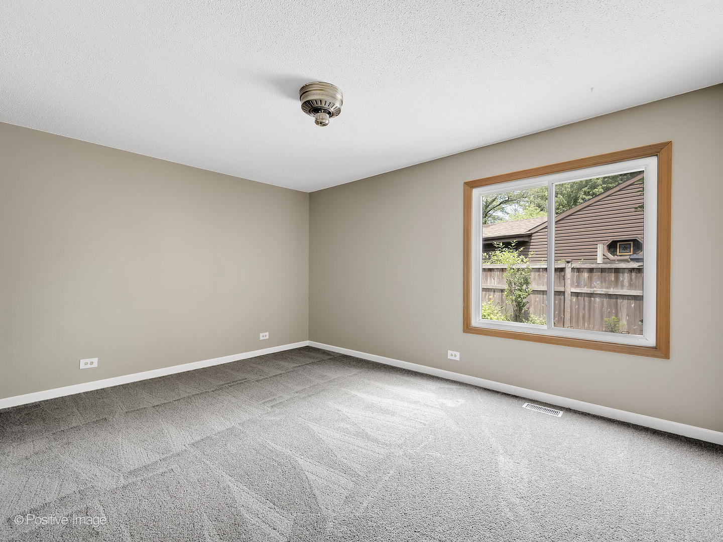 1985 Navarone Drive Naperville, IL 60565 - Photo 15 of 24 an empty room with a window