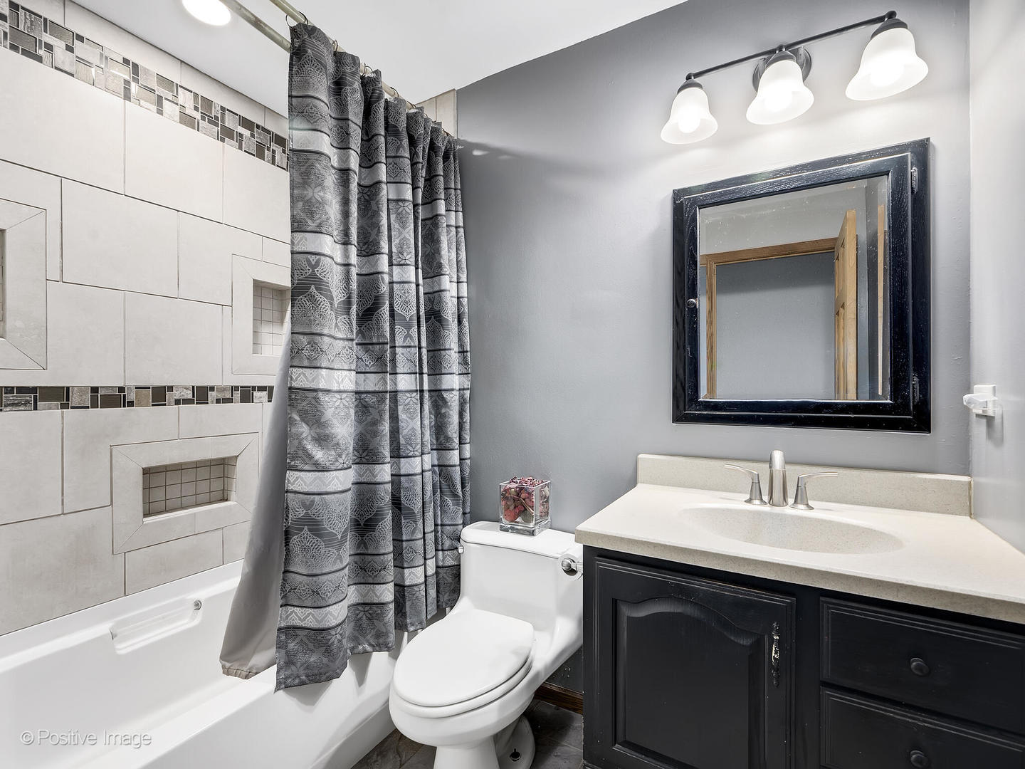 1985 Navarone Drive Naperville, IL 60565 - Photo 16 of 24 a bathroom with a sink toilet and shower