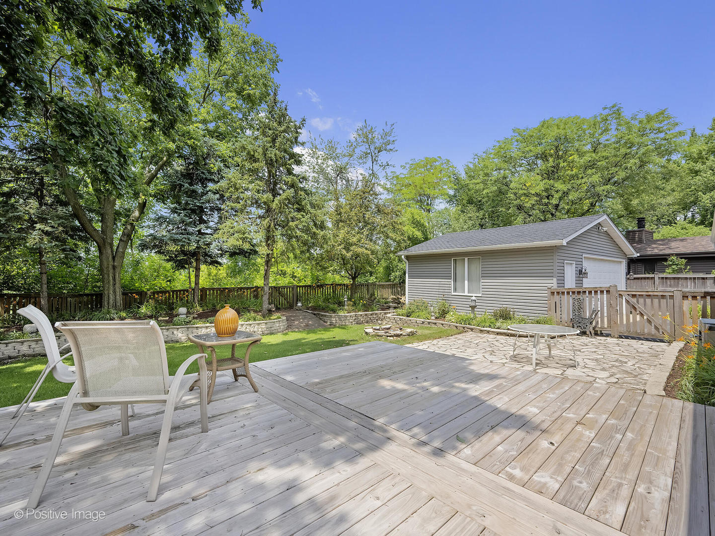 1985 Navarone Drive Naperville, IL 60565 - Photo 19 of 24 a view of a house with backyard and sitting area