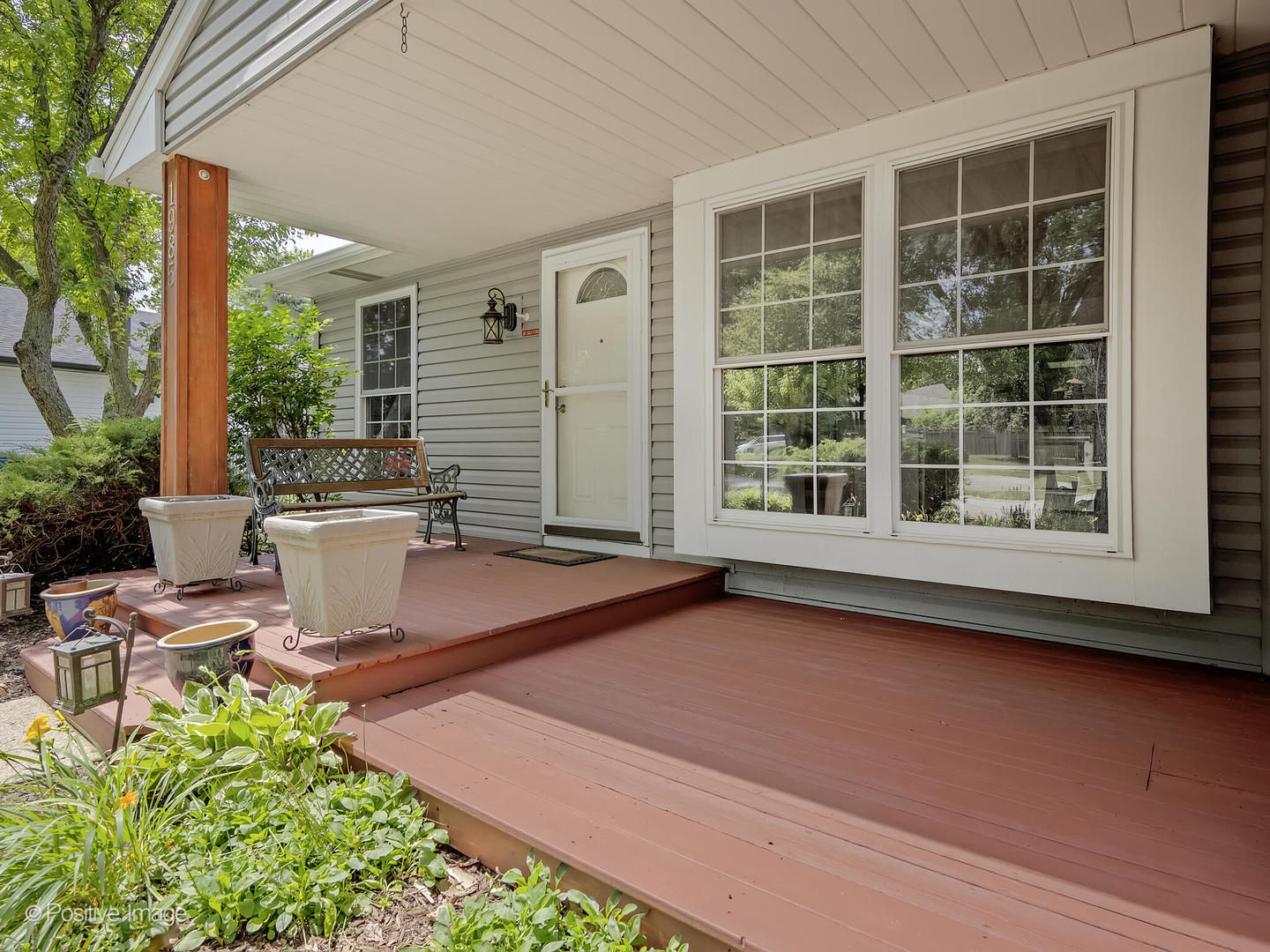 1985 Navarone Drive Naperville, IL 60565 - Photo 2 of 24 a view of a patio with table and chairs and potted plants