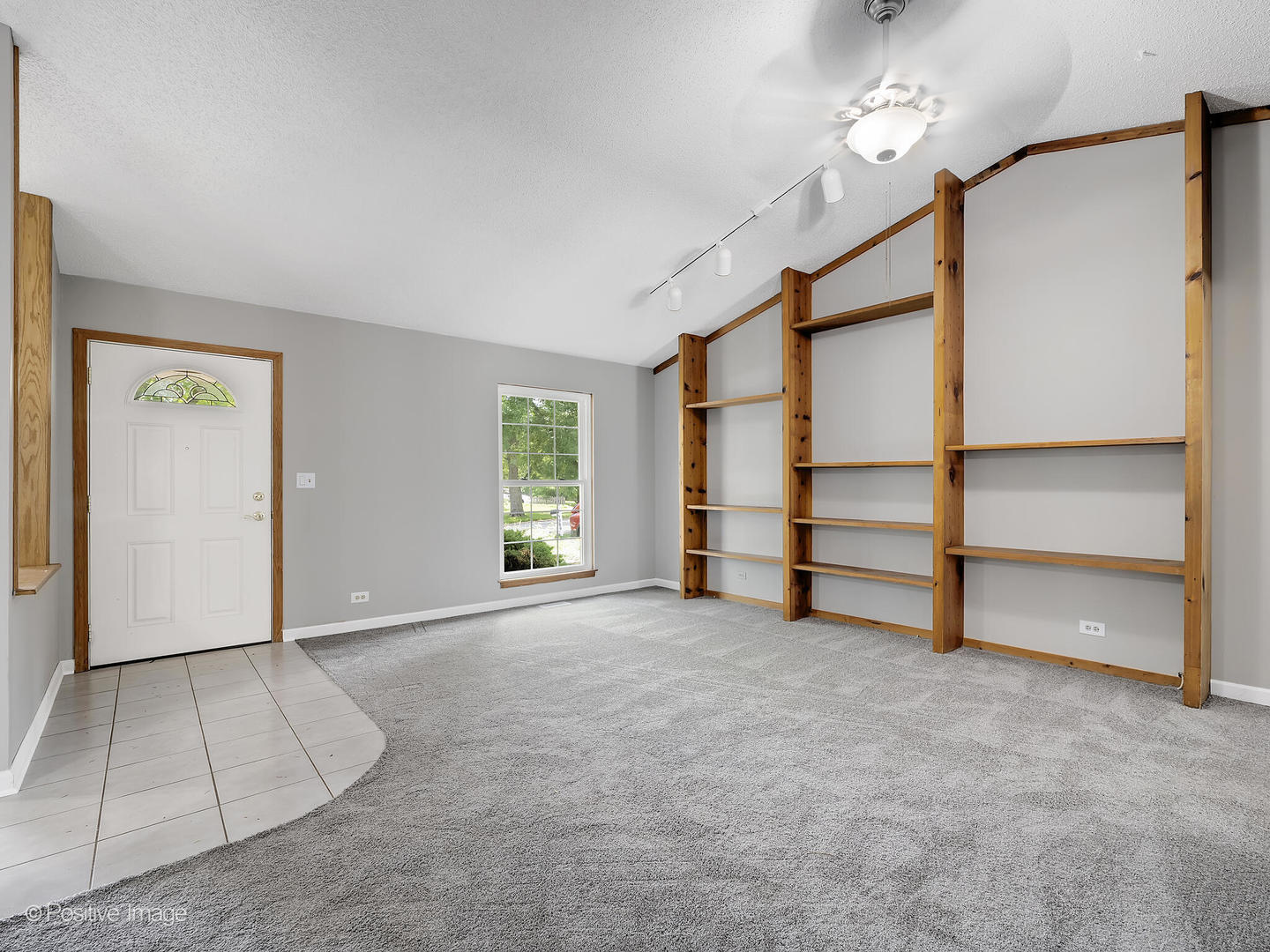 1985 Navarone Drive Naperville, IL 60565 - Photo 3 of 24 a view of an empty room with a window