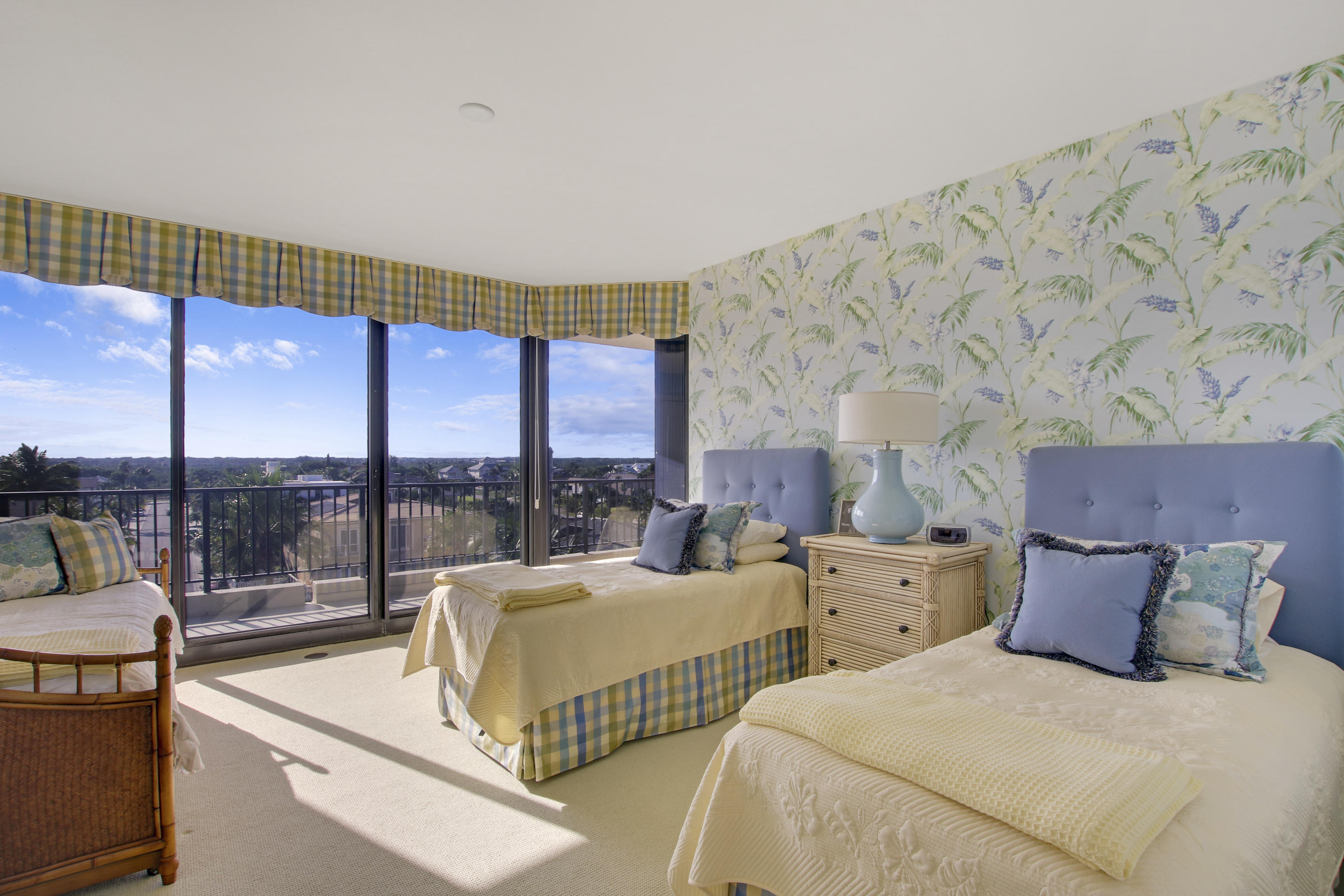 570 Ocean Drive, Unit 601 Juno Beach, FL 33408 - Photo 21 of 35 a large bedroom with two large bed and a large window