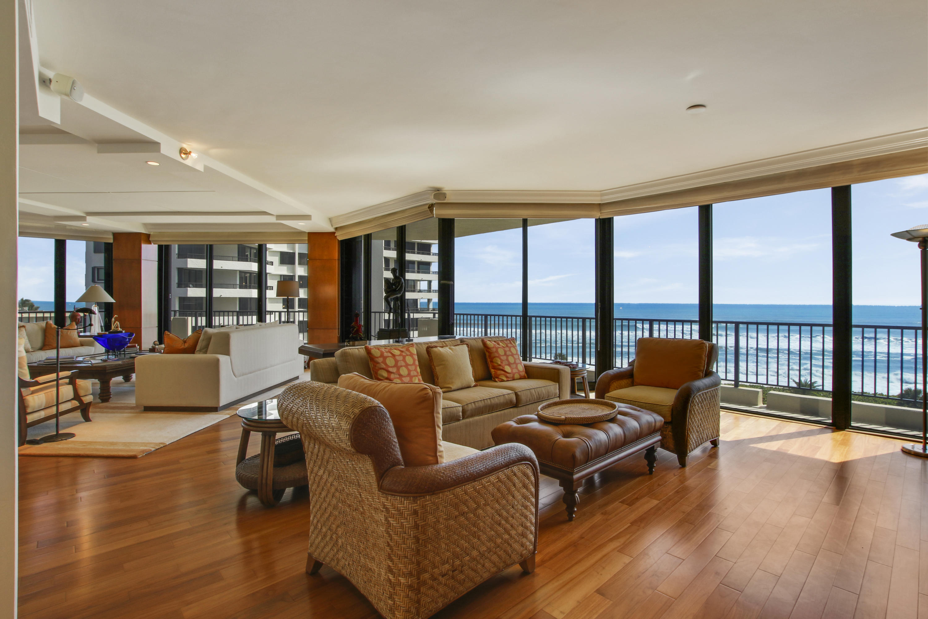 570 Ocean Drive, Unit 601 Juno Beach, FL 33408 - Photo 7 of 35 a living room with furniture and a large window
