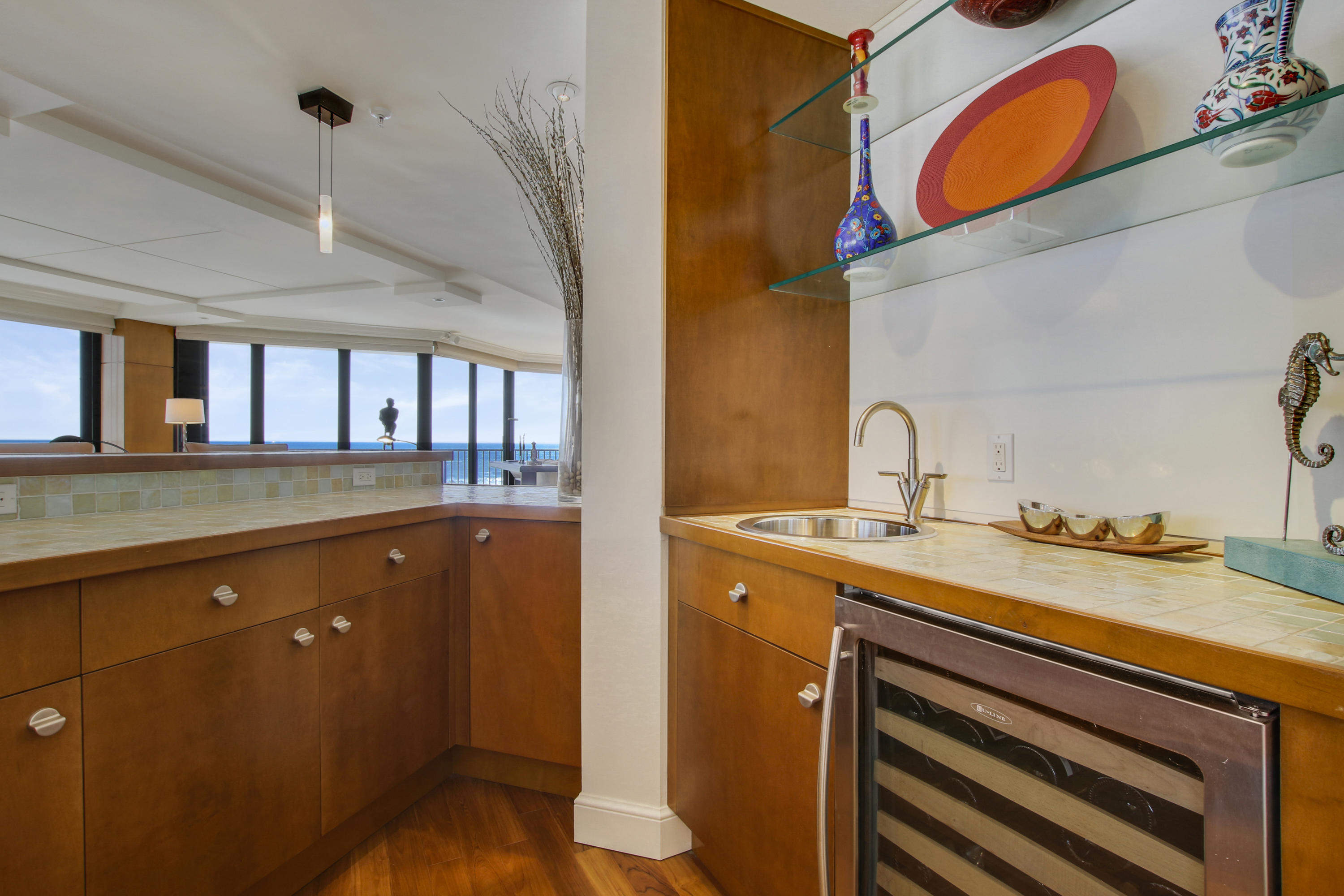 570 Ocean Drive, Unit 601 Juno Beach, FL 33408 - Photo 8 of 35 a bathroom with a sink and a mirror