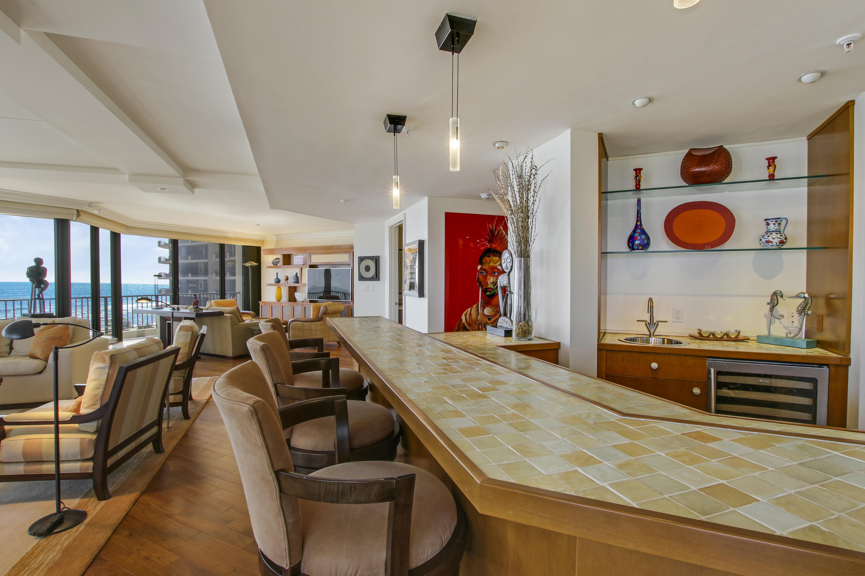 570 Ocean Drive, Unit 601 Juno Beach, FL 33408 - Photo 9 of 35 a living room with furniture and a flat screen tv