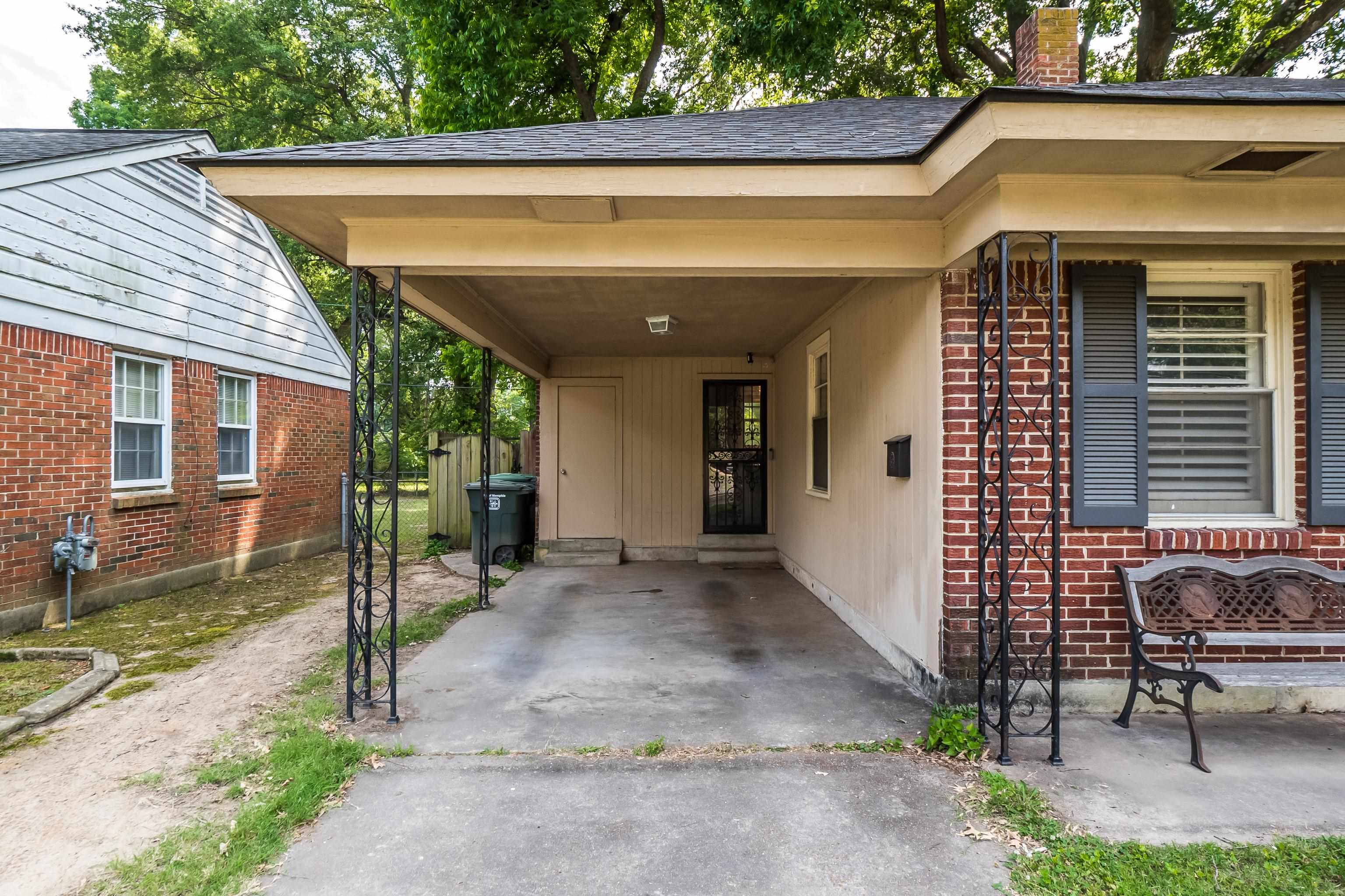 5069 Quince Road Memphis, TN 38117 - Photo 3 of 25 a view of a house with a patio