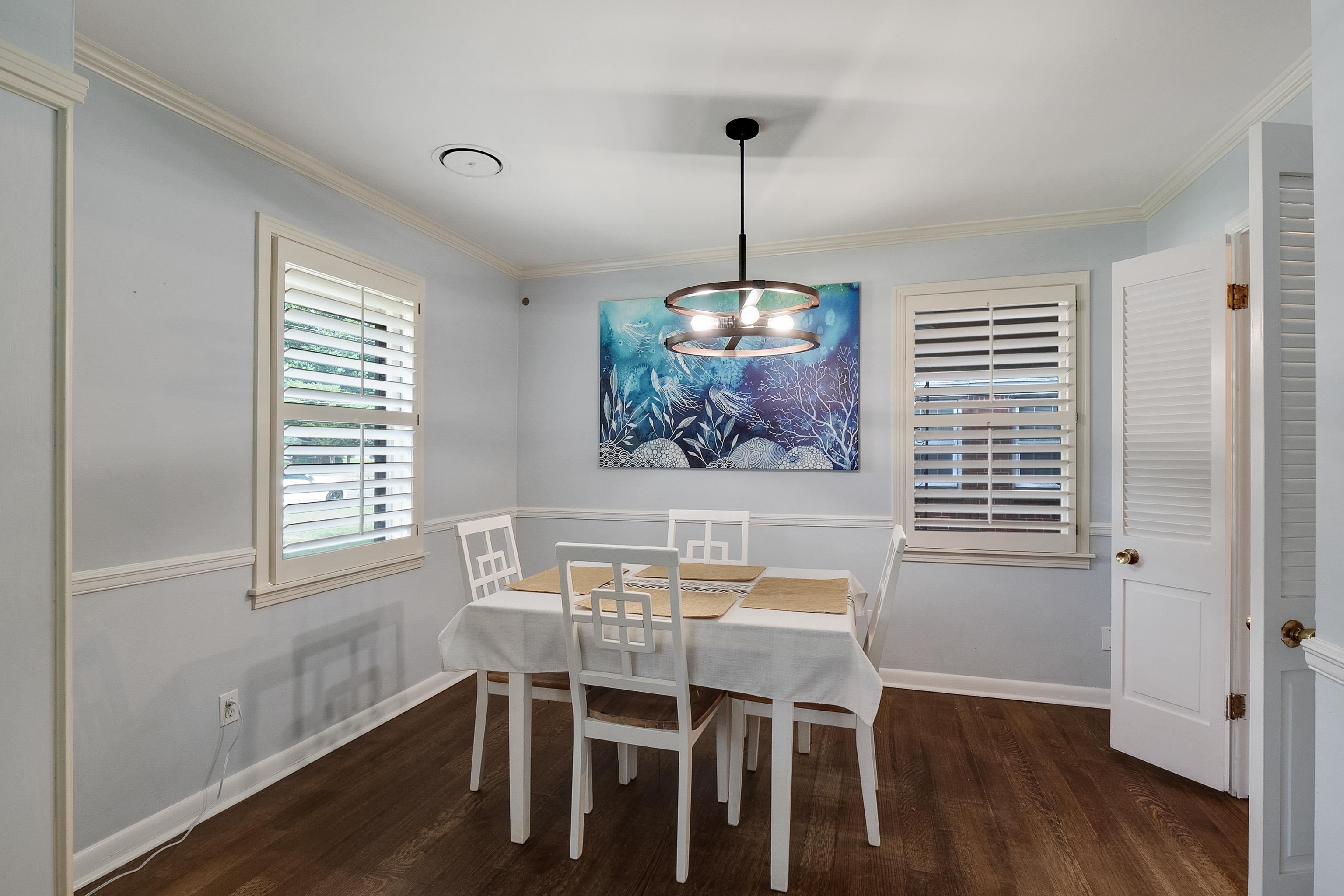5069 Quince Road Memphis, TN 38117 - Photo 8 of 25 a view of a dining room with furniture window and wooden floor