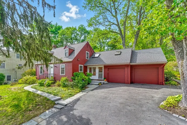 front view of a house with a garden