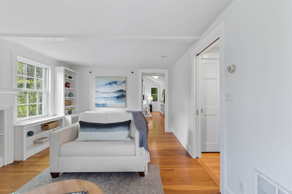 22 Burlington Street Lexington, MA 02420 - Photo 15 of 32 a living room with furniture and a large window