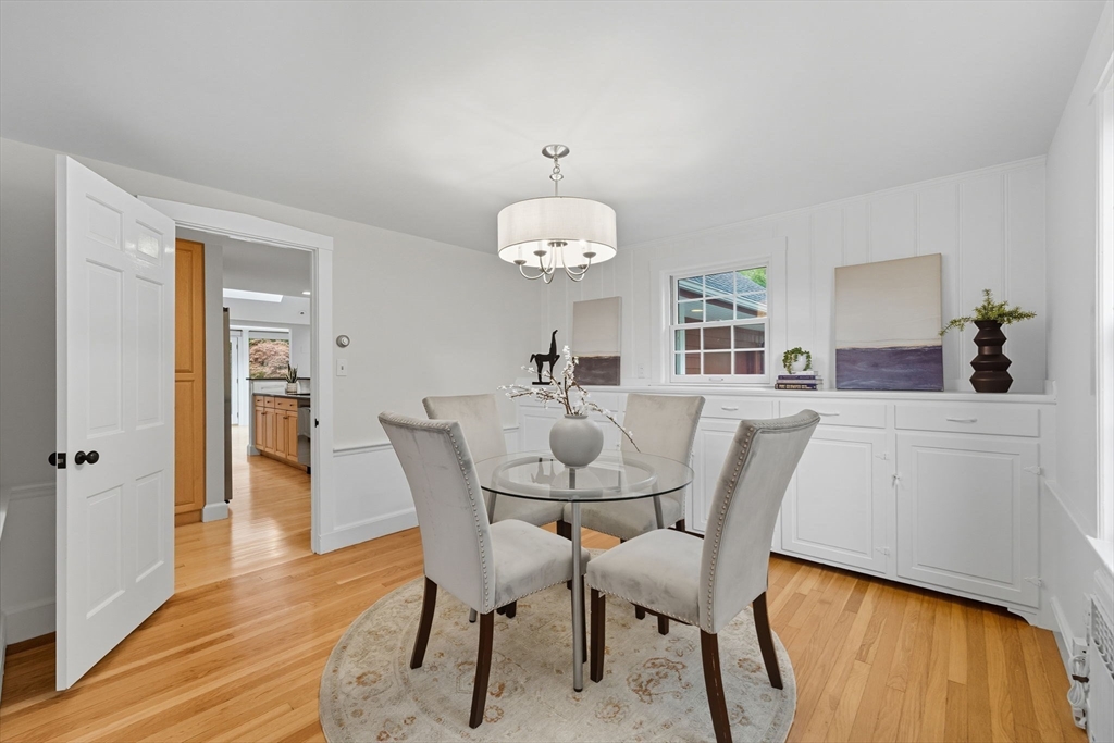 22 Burlington Street Lexington, MA 02420 - Photo 23 of 32 a dining room with furniture and wooden floor