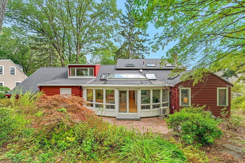 22 Burlington Street Lexington, MA 02420 - Photo 27 of 32 front view of a house with a garden