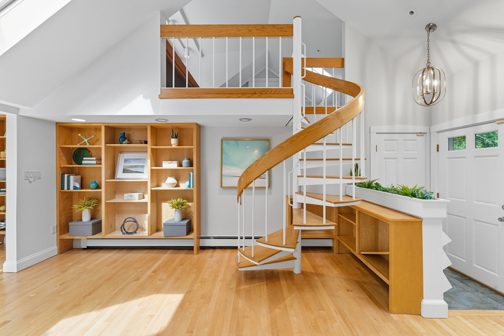 22 Burlington Street Lexington, MA 02420 - Photo 3 of 32 a view of an entryway with wooden floor and door