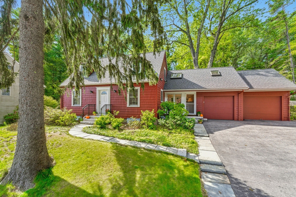 22 Burlington Street Lexington, MA 02420 - Photo 31 of 32 a front view of a house with garden