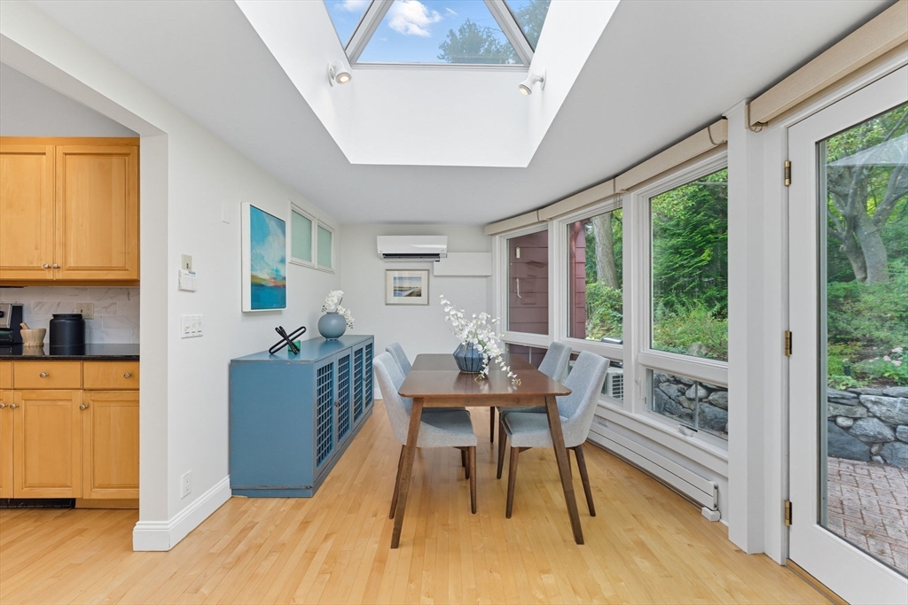 22 Burlington Street Lexington, MA 02420 - Photo 7 of 32 a living room with furniture and a large window