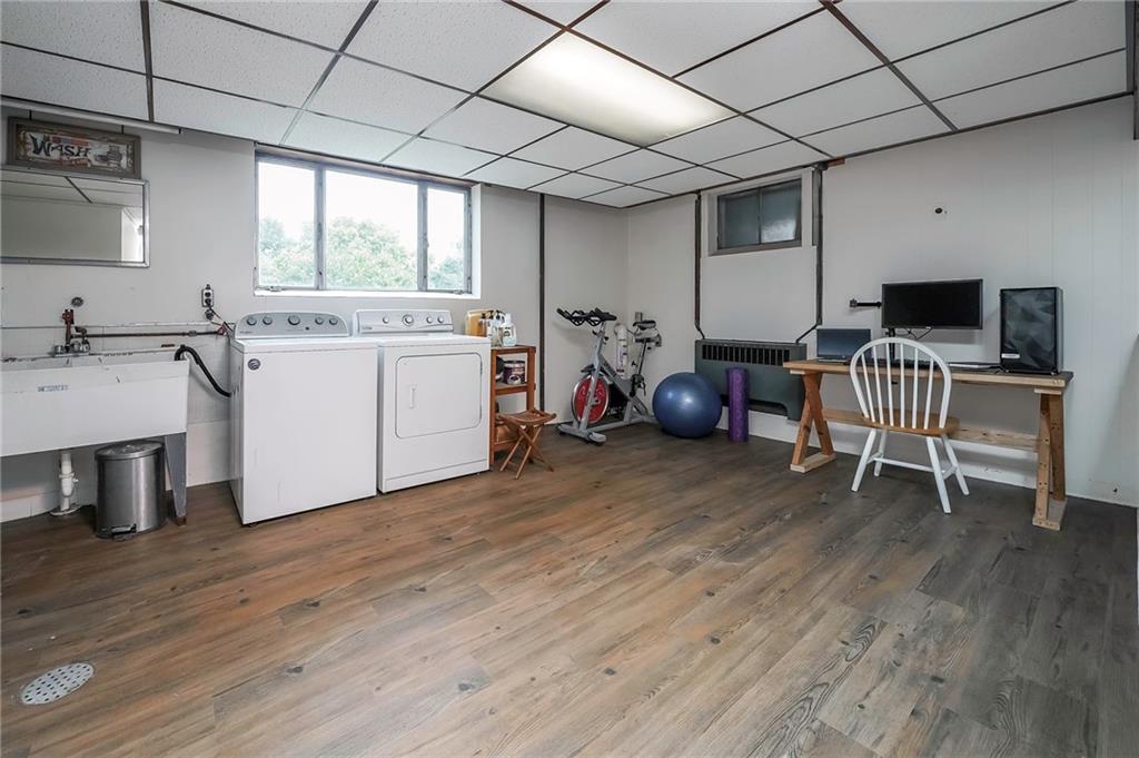 282 Coraopolis Road Coraopolis, PA 15108 - Photo 19 of 25 Brand new flooring on the lower level and so much space for laundry, workout area or office.