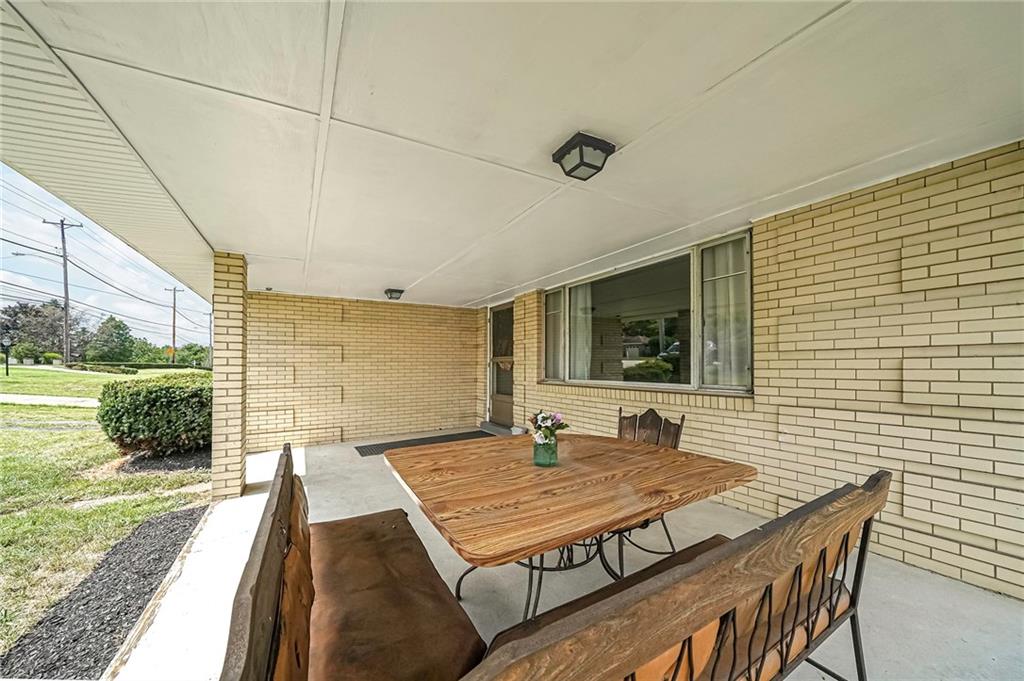 282 Coraopolis Road Coraopolis, PA 15108 - Photo 3 of 25 Huge covered front porch to host neighbors, family and friends.