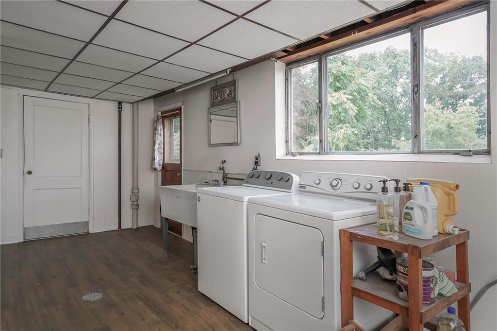282 Coraopolis Road Coraopolis, PA 15108 - Photo 21 of 25 Laundry area walks out to the backyard and provides access to the 2 car Tandem garage.