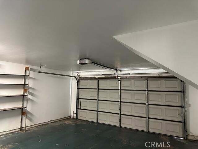 16115 3/4 Eucalyptus Avenue, Unit A Bellflower, CA 90706 - Photo 17 of 17 a view of a room with racks on the wall