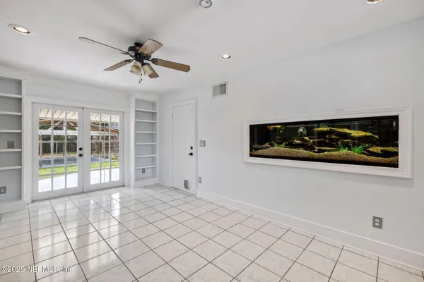 a view of an empty room and window
