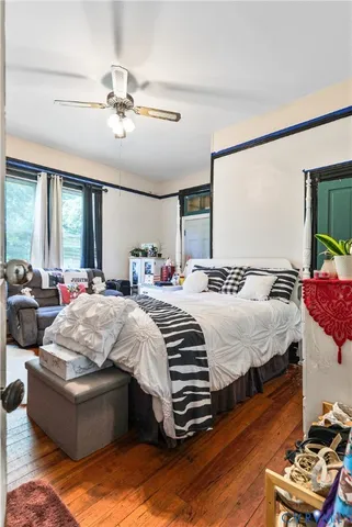 a bed room with a bed and a couch