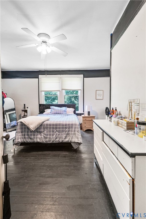 265 Proctor Street Drakes Branch, VA 23937 - Photo 22 of 29 a bedroom with a bed wooden floor and window