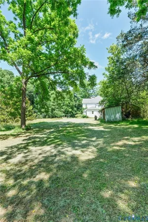 a view of a garden with trees