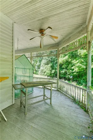 a view of a porch with furniture