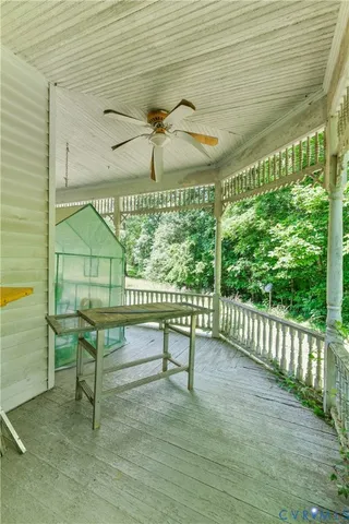 a view of a porch with furniture