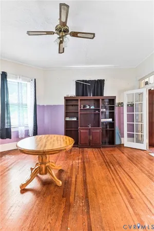 a bed room with a bed and dresser