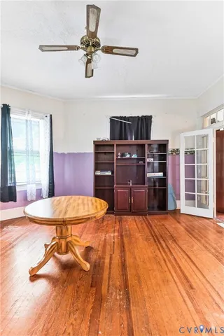 a bed room with a bed and dresser