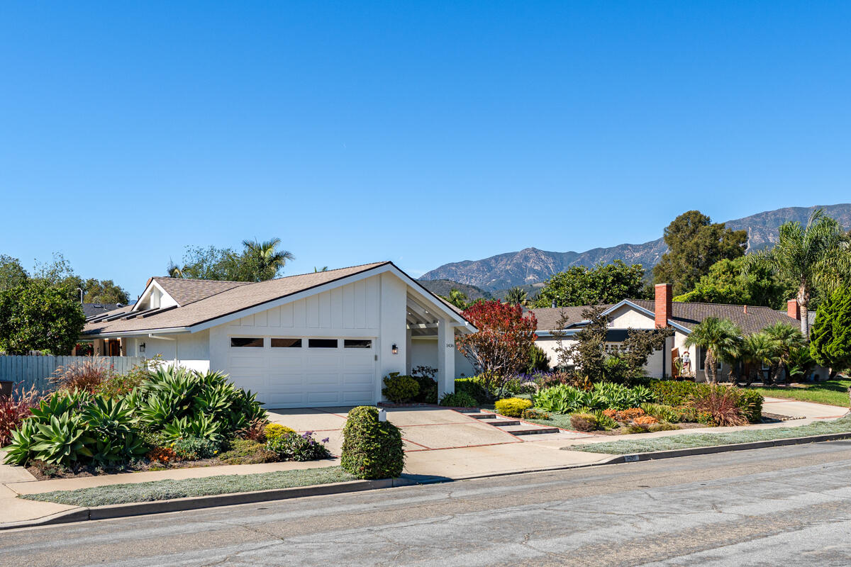 front view of a house with a street