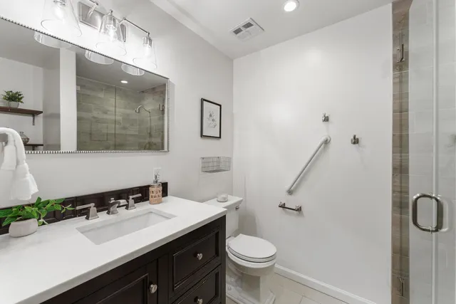 a view of a backyard with a patio and outdoor seating