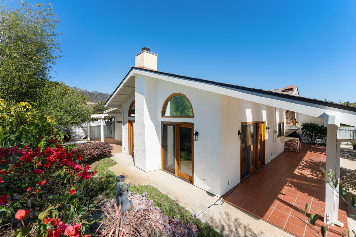 1436 Carnation Place Carpinteria, CA 93013 - Photo 18 of 32 a front view of a house with yard