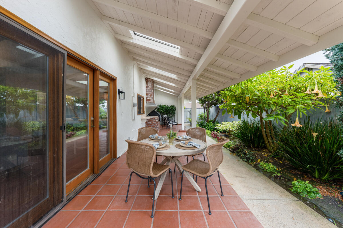 1436 Carnation Place Carpinteria, CA 93013 - Photo 20 of 32 a dining room with furniture and garden view