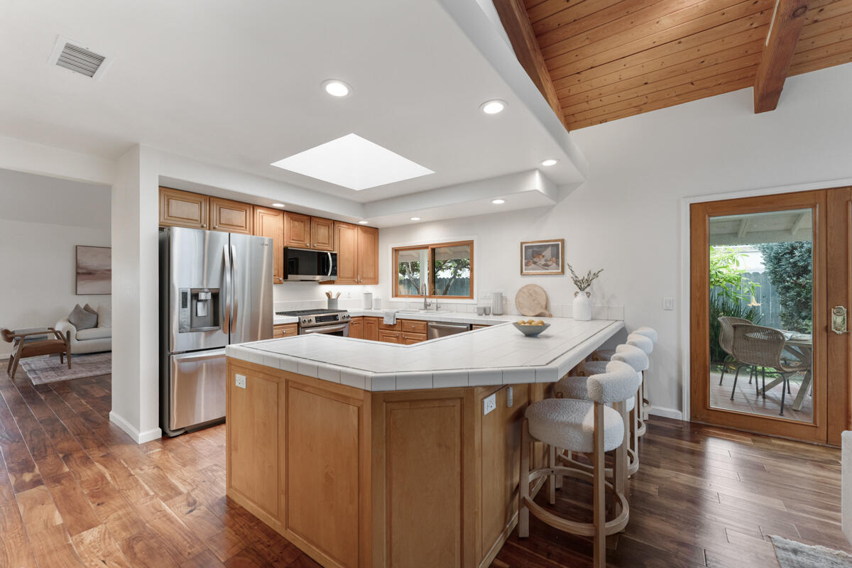 1436 Carnation Place Carpinteria, CA 93013 - Photo 27 of 32 a view of a dining room with furniture window and wooden floor