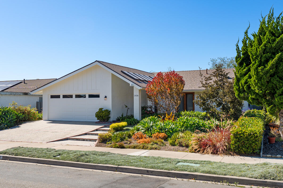 1436 Carnation Place Carpinteria, CA 93013 - Photo 3 of 32 front view of a house with a bench