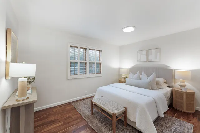 a bathroom with a sink toilet tub and shower