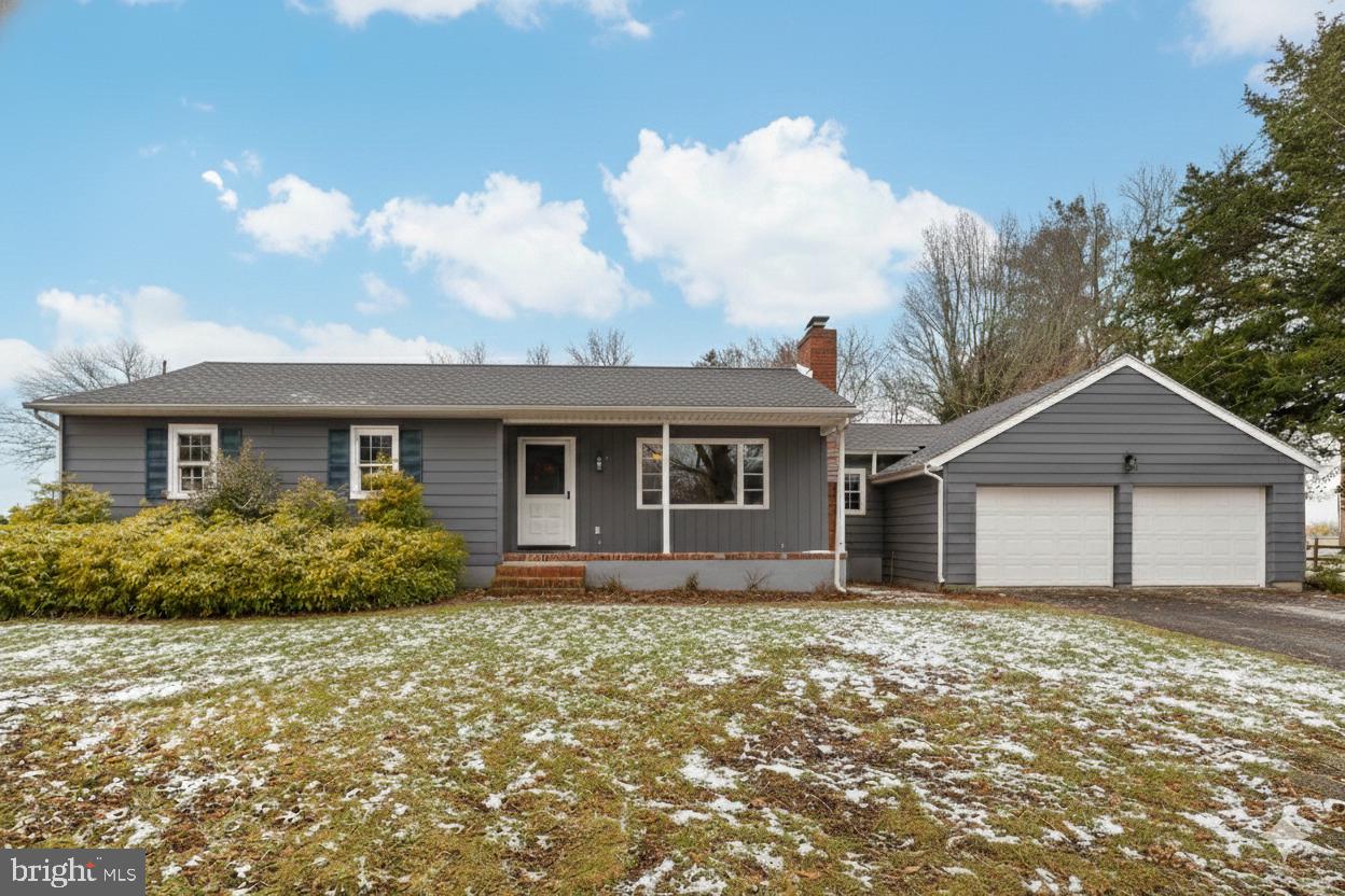 front view of a house with yard