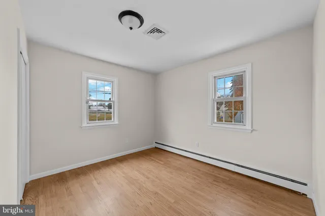 a view of a room that has a window in it