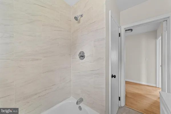 a bathroom with a bathtub