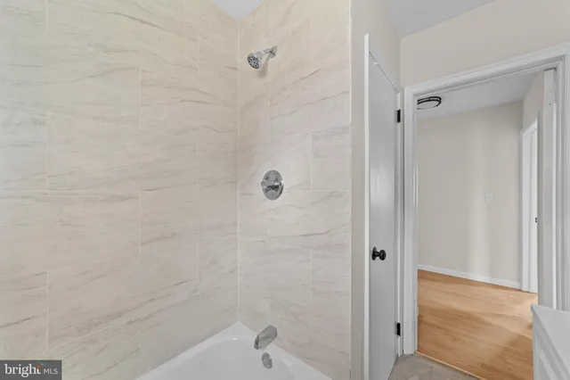 a bathroom with a bathtub